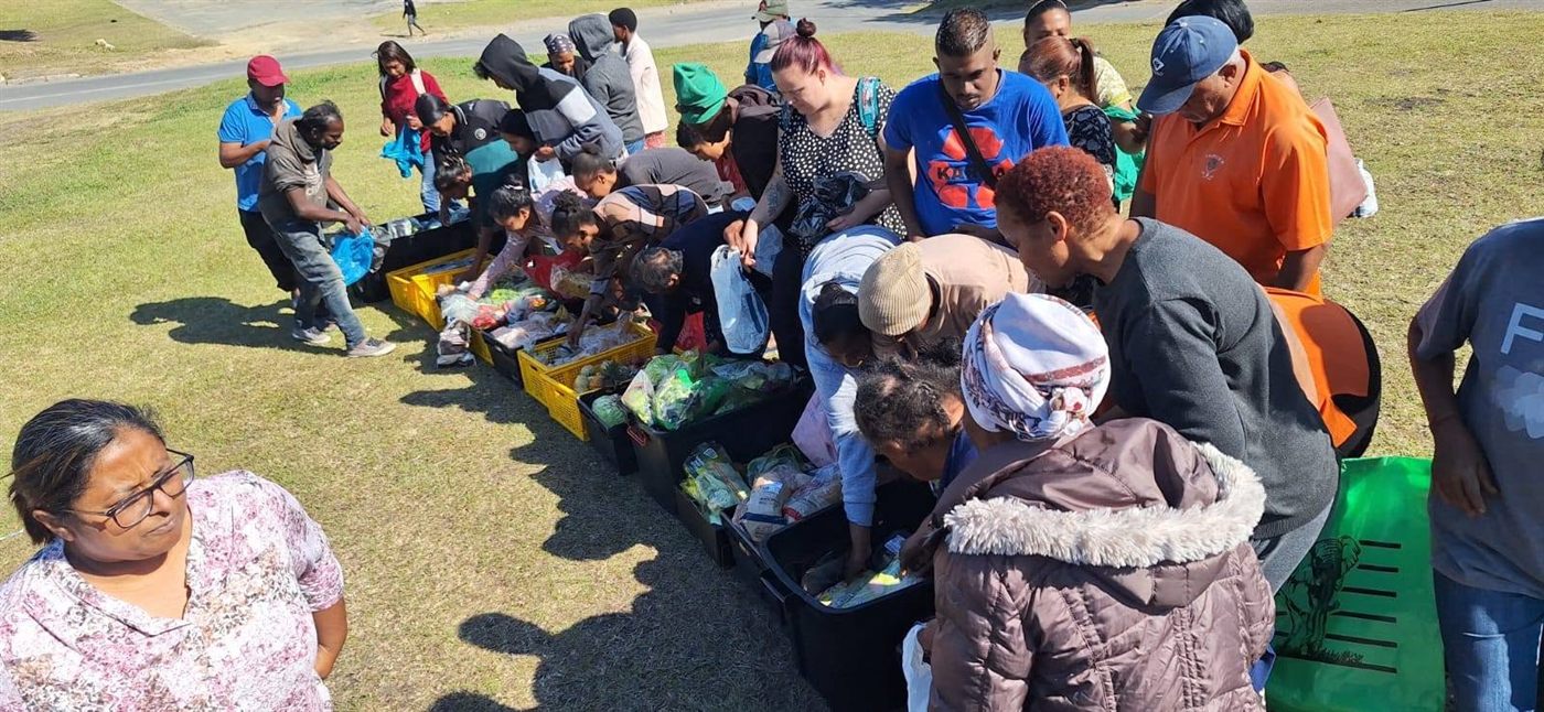 Families gathering for food parcels