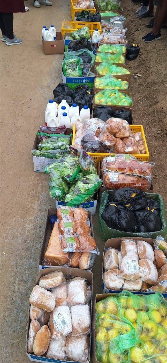 Crates of food set out for families